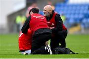 15 June 2025; Craig Lennon of Louth receives medical attention during the GAA Football All-Ireland Senior Championship Round 3 match between Louth and Clare at Laois Hire O'Moore Park in Portlaoise, Laois. Photo by Shauna Clinton/Sportsfile