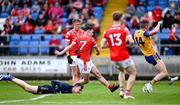 15 June 2025; Craig Lennon of Louth has a shot on goal during the GAA Football All-Ireland Senior Championship Round 3 match between Louth and Clare at Laois Hire O'Moore Park in Portlaoise, Laois. Photo by Shauna Clinton/Sportsfile