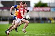 15 June 2025; Sam Mulroy of Louth is chased down by Emmet McMahon of Clare during the GAA Football All-Ireland Senior Championship Round 3 match between Louth and Clare at Laois Hire O'Moore Park in Portlaoise, Laois. Photo by Shauna Clinton/Sportsfile
