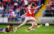 15 June 2025; Ciaran Downey of Louth shoots to score his side's second goal during the GAA Football All-Ireland Senior Championship Round 3 match between Louth and Clare at Laois Hire O'Moore Park in Portlaoise, Laois. Photo by Shauna Clinton/Sportsfile