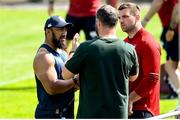 16 June 2025; Head coach Andy Farrell, centre, speaks with Bundee Aki, left, Tadhg Beirne during the British & Irish Lions rugby squad training at the UCD Bowl in Dublin. Photo by David Fitzgerald/Sportsfile
