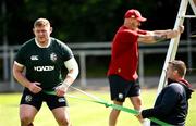 16 June 2025; Tadhg Furlong, left, and assistant coach John Fogarty during the British & Irish Lions rugby squad training at the UCD Bowl in Dublin. Photo by Ramsey Cardy/Sportsfile