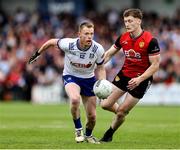 15 June 2025; Ryan McAnespie of Monaghan in action against Odhran Murdock of Down during the GAA Football All-Ireland Senior Championship Round 3 match between Monaghan and Down at BOX-IT Athletic Grounds in Armagh. Photo by Thomas Flinkow/Sportsfile
