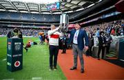 14 June 2025; Schalk Brits and Reggie Corrigan bring out the URC trophy before the United Rugby Championship Grand Final match between Leinster and Vodacom Bulls at Croke Park in Dublin. Photo by Brendan Moran/Sportsfile