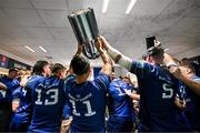 14 June 2025; James Lowe of Leinster brings the trophy into the dressingroom as the team celebtate after the United Rugby Championship Grand Final match between Leinster and Vodacom Bulls at Croke Park in Dublin. Photo by Brendan Moran/Sportsfile