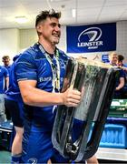 14 June 2025; Dan Sheehan of Leinster celebrates with the URC trophy in the dressingroom after the United Rugby Championship Grand Final match between Leinster and Vodacom Bulls at Croke Park in Dublin. Photo by Brendan Moran/Sportsfile