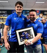 14 June 2025; Alex Soroka of Leinster, left, makes a presentation to his brother Ivan after the United Rugby Championship Grand Final match between Leinster and Vodacom Bulls at Croke Park in Dublin. Photo by Brendan Moran/Sportsfile