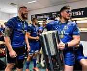 14 June 2025; RG Snyman, left, and Joe McCarthy of Leinster celebrate with the URC trophy in the dressingroom after the United Rugby Championship Grand Final match between Leinster and Vodacom Bulls at Croke Park in Dublin. Photo by Brendan Moran/Sportsfile