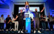 14 June 2025; Leinster players James Ryan, left, and RG Snyman show the URC trophy off to friends and family at a post match event in the RDS, Dublin, following the United Rugby Championship Grand Final match between Leinster and Vodacom Bulls. Photo by Brendan Moran/Sportsfile