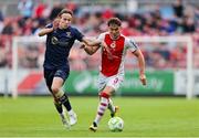 16 June 2025; Anto Breslin of St. Patrick's Athletic in action against Harry Wood of Shelbourne during the SSE Airtricity Men's Premier Division match between St Patrick's Athletic and Shelbourne at Richmond Park in Dublin. Photo by Thomas Flinkow/Sportsfile
