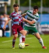 16 June 2025; Darragh Markey of Drogheda United in action against Josh Honohan of Shamrock Rovers during the SSE Airtricity Men's Premier Division match between Drogheda United and Shamrock Rovers at Sullivan & Lambe Park in Drogheda, Louth. Photo by Ben McShane/Sportsfile