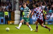 16 June 2025; Matt Healy of Shamrock Rovers in action against Darragh Markey of Drogheda United during the SSE Airtricity Men's Premier Division match between Drogheda United and Shamrock Rovers at Sullivan & Lambe Park in Drogheda, Louth. Photo by Ben McShane/Sportsfile