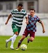 16 June 2025; Graham Burke of Shamrock Rovers in action against Darragh Markey of Drogheda United during the SSE Airtricity Men's Premier Division match between Drogheda United and Shamrock Rovers at Sullivan & Lambe Park in Drogheda, Louth. Photo by Ben McShane/Sportsfile