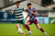 16 June 2025; Luke Heeney of Drogheda United in action against Josh Honohan of Shamrock Rovers during the SSE Airtricity Men's Premier Division match between Drogheda United and Shamrock Rovers at Sullivan & Lambe Park in Drogheda, Louth. Photo by Ben McShane/Sportsfile