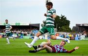 16 June 2025; Dylan Watts of Shamrock Rovers is tackled by Shane Farrell of Drogheda United during the SSE Airtricity Men's Premier Division match between Drogheda United and Shamrock Rovers at Sullivan & Lambe Park in Drogheda, Louth. Photo by Shauna Clinton/Sportsfile