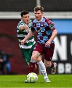 16 June 2025; Conor Kane of Drogheda United in action against Aaron Greene of Shamrock Rovers during the SSE Airtricity Men's Premier Division match between Drogheda United and Shamrock Rovers at Sullivan & Lambe Park in Drogheda, Louth. Photo by Ben McShane/Sportsfile