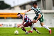 16 June 2025; Conor Kane of Drogheda United is tackled by Josh Honohan of Shamrock Rovers during the SSE Airtricity Men's Premier Division match between Drogheda United and Shamrock Rovers at Sullivan & Lambe Park in Drogheda, Louth. Photo by Ben McShane/Sportsfile