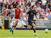 16 June 2025; Harry Wood of Shelbourne in action against Barry Baggley of St. Patrick's Athletic during the SSE Airtricity Men's Premier Division match between St Patrick's Athletic and Shelbourne at Richmond Park in Dublin. Photo by Thomas Flinkow/Sportsfile