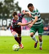 16 June 2025; Trevor Clarke of Shamrock Rovers in action against Kieran Cruise of Drogheda United during the SSE Airtricity Men's Premier Division match between Drogheda United and Shamrock Rovers at Sullivan & Lambe Park in Drogheda, Louth. Photo by Shauna Clinton/Sportsfile
