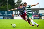 16 June 2025; Trevor Clarke of Shamrock Rovers in action against Kieran Cruise of Drogheda United during the SSE Airtricity Men's Premier Division match between Drogheda United and Shamrock Rovers at Sullivan & Lambe Park in Drogheda, Louth. Photo by Shauna Clinton/Sportsfile