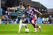 16 June 2025; Conor Kane of Drogheda United in action against Danny Grant of Shamrock Rovers during the SSE Airtricity Men's Premier Division match between Drogheda United and Shamrock Rovers at Sullivan & Lambe Park in Drogheda, Louth. Photo by Ben McShane/Sportsfile