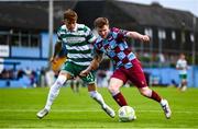 16 June 2025; Conor Kane of Drogheda United in action against Danny Grant of Shamrock Rovers during the SSE Airtricity Men's Premier Division match between Drogheda United and Shamrock Rovers at Sullivan & Lambe Park in Drogheda, Louth. Photo by Ben McShane/Sportsfile