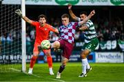 16 June 2025; Warren Davis of Drogheda United in action against Roberto Lopes of Shamrock Rovers during the SSE Airtricity Men's Premier Division match between Drogheda United and Shamrock Rovers at Sullivan & Lambe Park in Drogheda, Louth. Photo by Ben McShane/Sportsfile