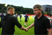 16 June 2025; St. Patrick's Athletic manager Stephen Kenny, right, and Shelbourne manager Damien Duff shake hands after the SSE Airtricity Men's Premier Division match between St Patrick's Athletic and Shelbourne at Richmond Park in Dublin. Photo by Thomas Flinkow/Sportsfile