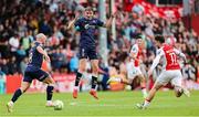 16 June 2025; Shelbourne players, from left, Mark Coyle and Sean Boyd, in action against Jay McClelland of St. Patrick's Athletic during the SSE Airtricity Men's Premier Division match between St Patrick's Athletic and Shelbourne at Richmond Park in Dublin. Photo by Thomas Flinkow/Sportsfile