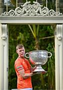 17 June 2025; Armagh footballer Oisín O'Neill poses for a portrait with the Sam Maguire Cup at the national launch of the GAA Football All-Ireland Senior Championship Series at the National Botanic Gardens in Dublin. Photo by Sam Barnes/Sportsfile