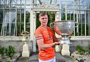 17 June 2025; Armagh footballer Oisín O'Neill poses for a portrait with the Sam Maguire Cup at the national launch of the GAA Football All-Ireland Senior Championship Series at the National Botanic Gardens in Dublin. Photo by Sam Barnes/Sportsfile