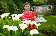 17 June 2025; Louth footballer Sam Mulroy poses for a portrait with the Sam Maguire Cup at the national launch of the GAA Football All-Ireland Senior Championship Series at the National Botanic Gardens in Dublin. Photo by Sam Barnes/Sportsfile