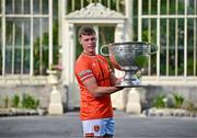 17 June 2025; Armagh footballer Oisín O'Neill poses for a portrait with the Sam Maguire Cup at the national launch of the GAA Football All-Ireland Senior Championship Series at the National Botanic Gardens in Dublin. Photo by Sam Barnes/Sportsfile