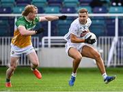 14 June 2025; Tommy Gill of Kildare in action against Cormac Egan of Offaly during the Tailteann Cup quarter-final match between Kildare and Offaly at Cedral St Conleth's Park in Newbridge, Kildare. Photo by Piaras Ó Mídheach/Sportsfile