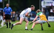 14 June 2025; Ryan Sinkey of Kildare in action against Daire McDaid of Offaly during the Tailteann Cup quarter-final match between Kildare and Offaly at Cedral St Conleth's Park in Newbridge, Kildare. Photo by Piaras Ó Mídheach/Sportsfile