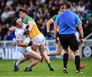 14 June 2025; Alex Beirne of Kildare is tackled by Jordan Hayes of Offaly during the Tailteann Cup quarter-final match between Kildare and Offaly at Cedral St Conleth's Park in Newbridge, Kildare. Photo by Piaras Ó Mídheach/Sportsfile