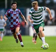 16 June 2025; Michael Noonan of Shamrock Rovers in action against Luke Heeney of Drogheda United during the SSE Airtricity Men's Premier Division match between Drogheda United and Shamrock Rovers at Sullivan & Lambe Park in Drogheda, Louth. Photo by Shauna Clinton/Sportsfile