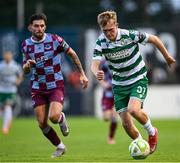 16 June 2025; Michael Noonan of Shamrock Rovers in action against Luke Heeney of Drogheda United during the SSE Airtricity Men's Premier Division match between Drogheda United and Shamrock Rovers at Sullivan & Lambe Park in Drogheda, Louth. Photo by Shauna Clinton/Sportsfile