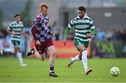 16 June 2025; Danny Mandroiu of Shamrock Rovers in action against Shane Farrell of Drogheda United during the SSE Airtricity Men's Premier Division match between Drogheda United and Shamrock Rovers at Sullivan & Lambe Park in Drogheda, Louth. Photo by Shauna Clinton/Sportsfile