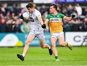 14 June 2025; Kevin Feely of Kildare in action against Jack McEvoy of Offaly during the Tailteann Cup quarter-final match between Kildare and Offaly at Cedral St Conleth's Park in Newbridge, Kildare. Photo by Piaras Ó Mídheach/Sportsfile
