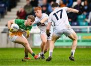 14 June 2025; Jack Bryant of Offaly in action against Harry O'Neill and Ryan Burke, 17, of Kildare during the Tailteann Cup quarter-final match between Kildare and Offaly at Cedral St Conleth's Park in Newbridge, Kildare. Photo by Piaras Ó Mídheach/Sportsfile