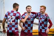 16 June 2025; George Cooper of Drogheda United, centre, celebrates with teammates Conor Keeley, left, and Shane Farrell after scoring their side's first goal during the SSE Airtricity Men's Premier Division match between Drogheda United and Shamrock Rovers at Sullivan & Lambe Park in Drogheda, Louth. Photo by Shauna Clinton/Sportsfile