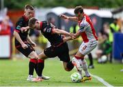 13 June 2025; Anto Breslin of St Patrick's Athletic in action against George Cooper of Drogheda United during the SSE Airtricity Men's Premier Division match between St Patrick's Athletic and Drogheda United at Richmond Park in Dublin. Photo by Shauna Clinton/Sportsfile