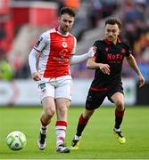 13 June 2025; Aidan Keena of St Patrick's Athletic in action against Darragh Markey of Drogheda United during the SSE Airtricity Men's Premier Division match between St Patrick's Athletic and Drogheda United at Richmond Park in Dublin. Photo by Shauna Clinton/Sportsfile