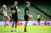 19 June 2025; Fin Smith, right, and assistant coach Jonathan Sexton during a British & Irish Lions captain's run at the Aviva Stadium in Dublin. Photo by Seb Daly/Sportsfile