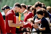 19 June 2025; Hugo Keenan signs autographs for supporters during a British & Irish Lions captain's run at the Aviva Stadium in Dublin. Photo by Seb Daly/Sportsfile