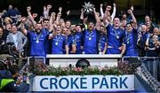 14 June 2025; Leinster captain Jack Conan and teammates celebrate as they lift the URC trophy on the steps of the Hogan Stand after the United Rugby Championship Grand Final match between Leinster and Vodacom Bulls at Croke Park in Dublin. Photo by Brendan Moran/Sportsfile