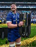 14 June 2025; Joe McCarthy of Leinster celebrates with the trophy after the United Rugby Championship Grand Final match between Leinster and Vodacom Bulls at Croke Park in Dublin. Photo by Brendan Moran/Sportsfile