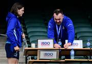 14 June 2025; Leinster assistant performance analyst Juliette Fortune, left, and senior team performance analyst Brian Colclough set up before the United Rugby Championship Grand Final match between Leinster and Vodacom Bulls at Croke Park in Dublin. Photo by Brendan Moran/Sportsfile