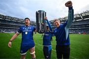 14 June 2025; Joe McCarthy of Leinster, celebrates with his brothers Andrew and Paddy, right, and the URC trophy after the United Rugby Championship Grand Final match between Leinster and Vodacom Bulls at Croke Park in Dublin. Photo by Brendan Moran/Sportsfile
